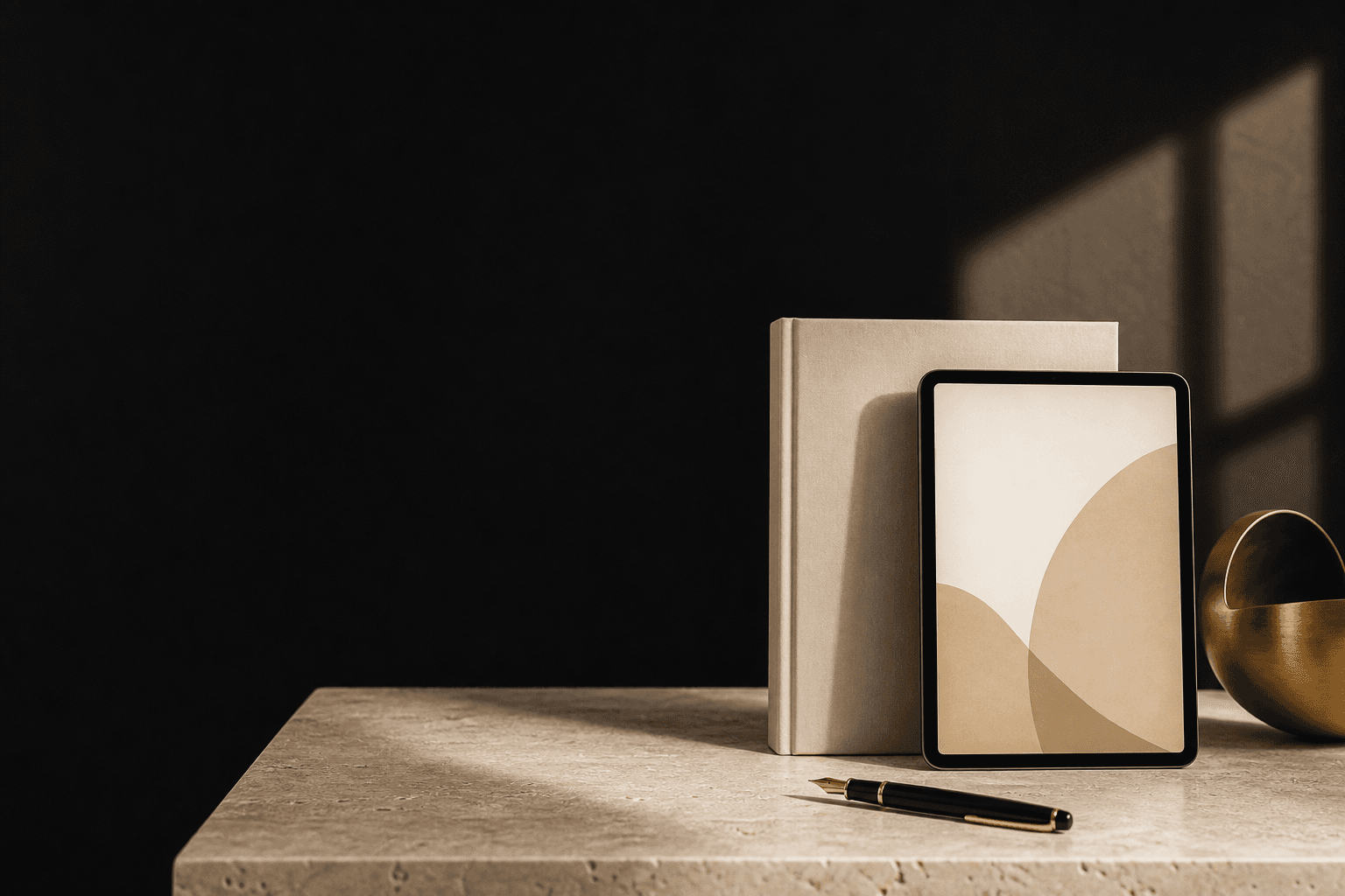 A calm workspace with a financial guide, tablet and pen